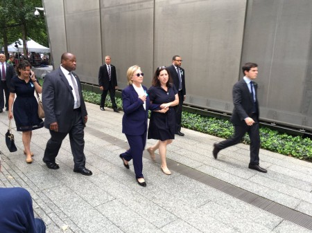Hillary Ground Zero handler behind her